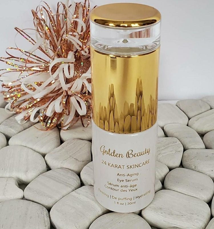 Golden Beauty 24K Anti-Aging Eye Serum styled on white stones