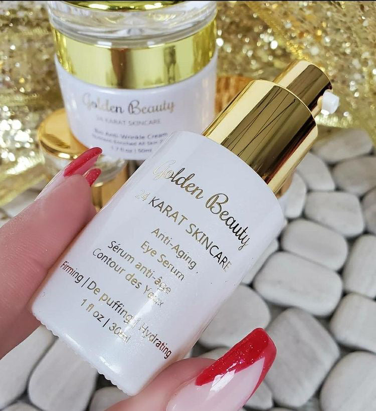Anti-Aging Eye Serum in hand with the Bio Anti-Wrinkle Cream behind it